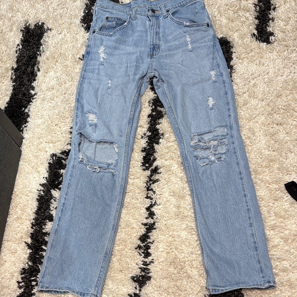Distressed Light Blue Jeans